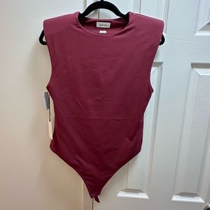 Contour shoulder pad bodysuit